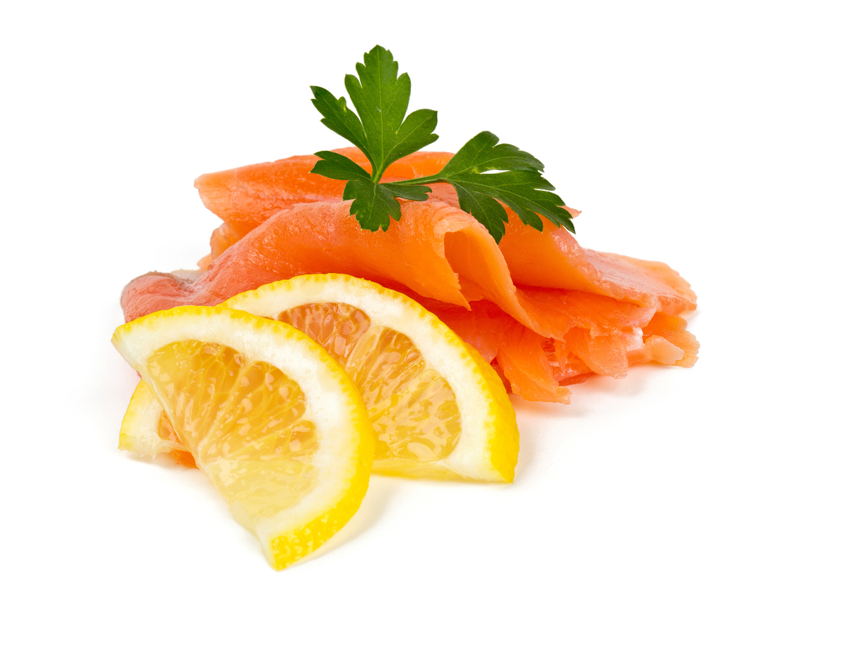 Fersh salmon with lemon on white background